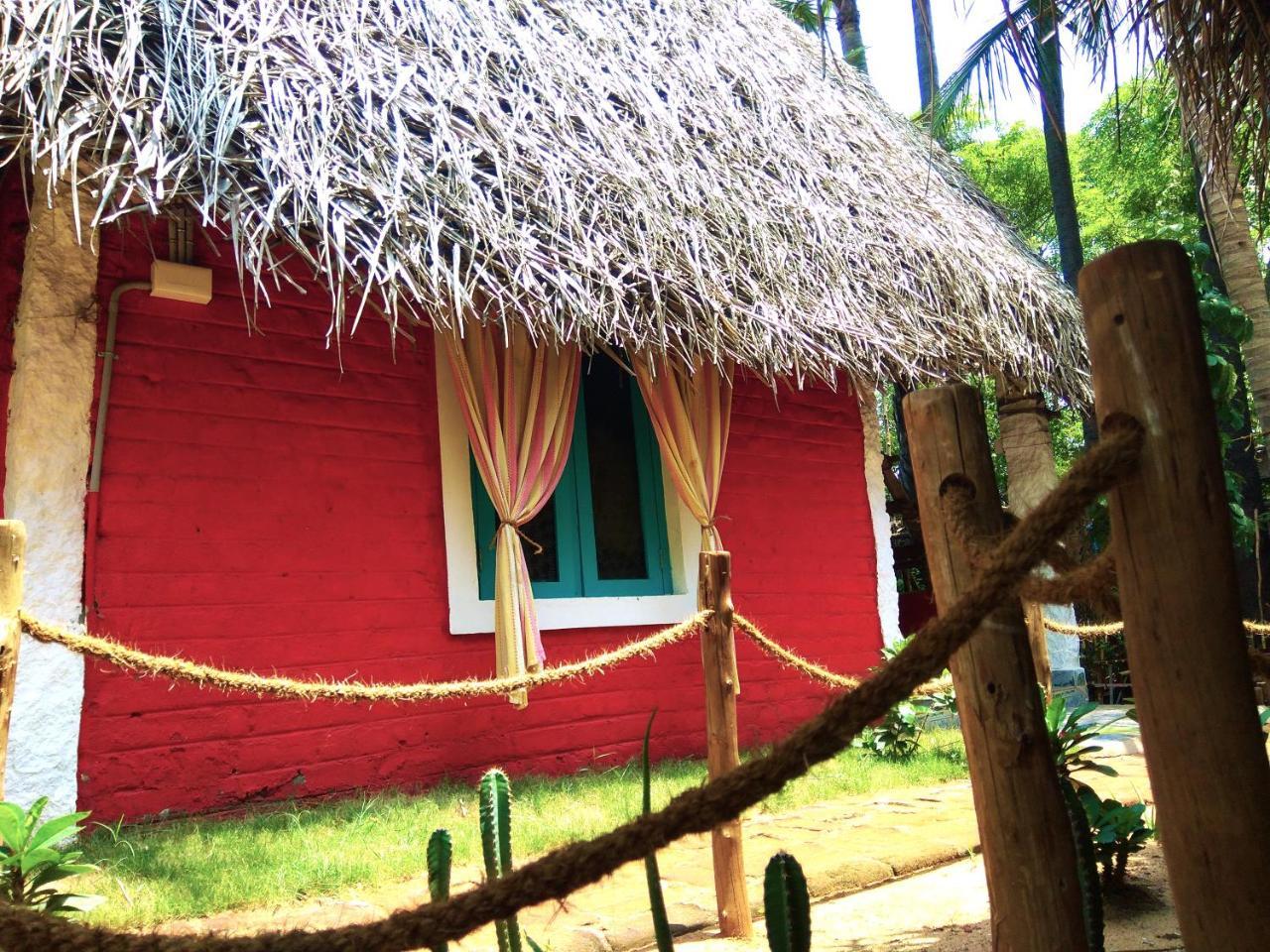 Dharmakanni Tropical Huts Ауровиль Экстерьер фото